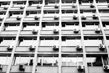 Exterior building with air conditioning. monochrome photo