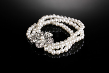 Pearl bracelet isolated on black