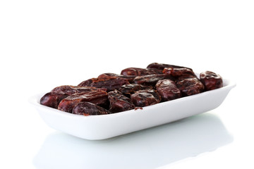delicious dried dates in packaging isolated on white