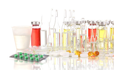 Tablets and ampoules isolated on white
