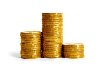 Columns of coins on white background, first place