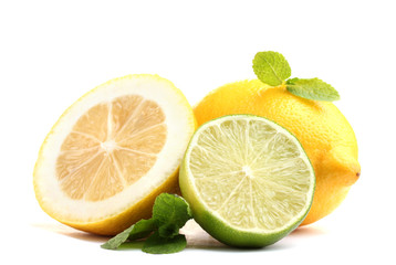 Obraz na płótnie Canvas Fresh lime and lemon with mint isolated on white