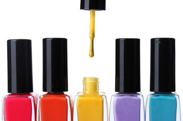 Group of bright nail polishes isolated on white