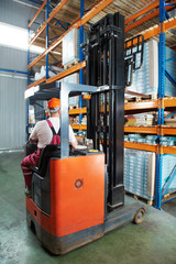 warehouse forklift loader at work