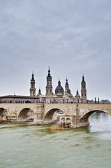 Fototapeta na wymiar Stone Bridge across the Ebro River at Zaragoza, Spain