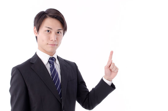 a portrait of asian businessman pointing