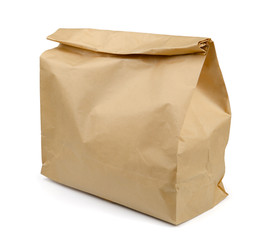 Brown paper lunch bag isolated on white