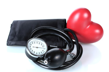 Black tonometer and heart isolated on white