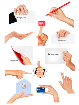 Set of hands holding different business objects