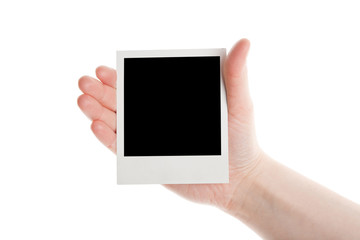 One instant photo in hand