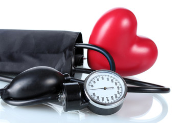 Black tonometer and heart isolated on white