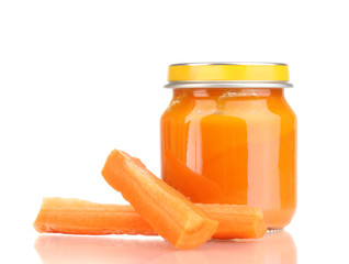 Jar of baby puree with carrot isolated on white