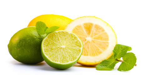 Fototapeta premium Fresh lime and lemon with mint isolated on white