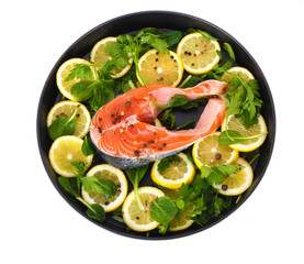 Red fish with lemon, parsley and pepper