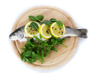 Fresh fish with lemon, parsley and pepper