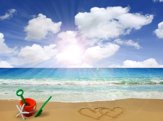 hearts drawn in beach