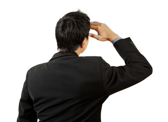 back of businessman looking