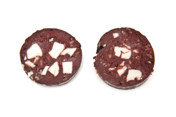 Black pudding or blood sausage on a white background.