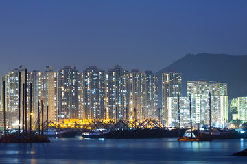Naklejka premium Hong Kong downtown along the coast