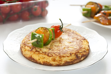 omelette with grilled vegetable skewer