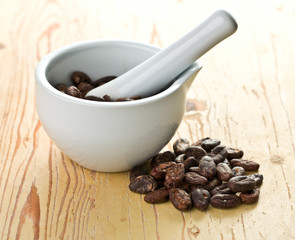 cocoa beans in mortar