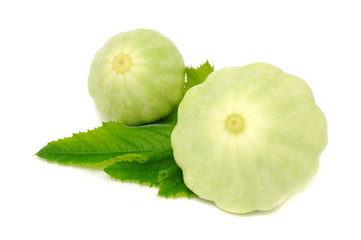 Scalloped Squashes with Green Leaf Isolated on White Background