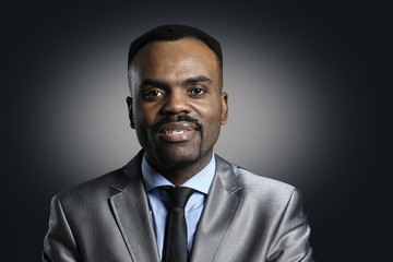 Face of happy Afro American businessma