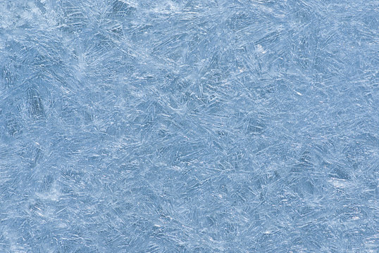 Abstract natural background - ice pattern on a water surface.