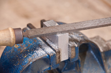 Grinding a block of metal