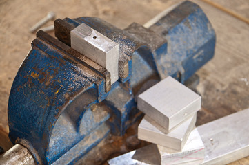 Vice with a block of metal