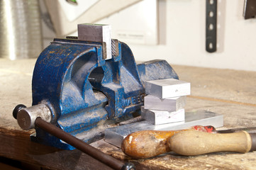 Vice with a block of metal
