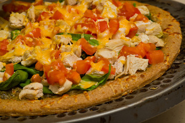 Pesto Spinach Tomato Pizza
