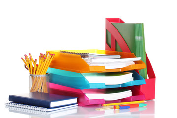 bright paper trays and stationery isolated on white