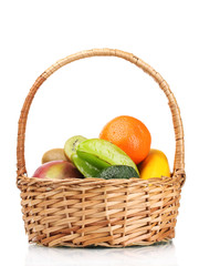 Assortment of exotic fruits in basket isolated on white