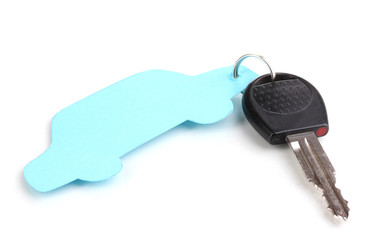 Car key with charm isolated on white