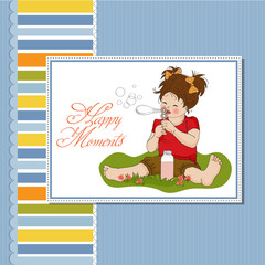 funny lovely little girl blowing soap bubbles