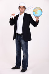 Architect holding globe