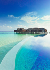 Infinity pool and water villas