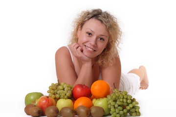 portrait of a smiling woman with fruits