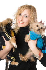 Portrait of smiling attractive blonde with two dogs. Isolated