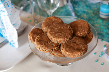 Stack of whole grain biscuits with decorated table set
