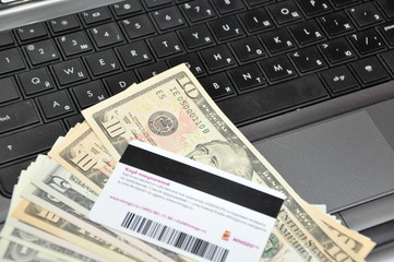 keyboard, money and plastic card