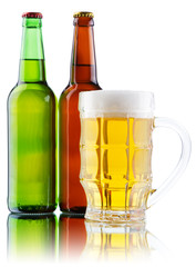 Beer mug and bottle isolated on white background