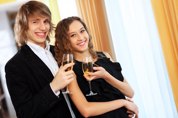 Couple in a restaurant with shampagne