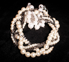 Pearl jewelry on black background