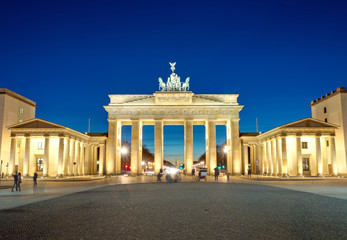 The illiminated Brandenburg Gate at dawn © elxeneize