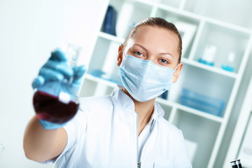 Fototapeta premium Young scientist working in laboratory