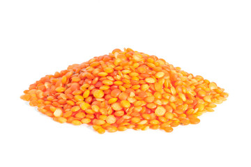 Pile Red lentils isolated on white background.