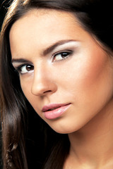 Obraz premium Closeup portrait of a young woman's face