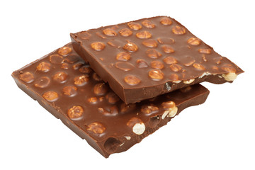 two halves of broken chocolate with hazelnuts isolated on white